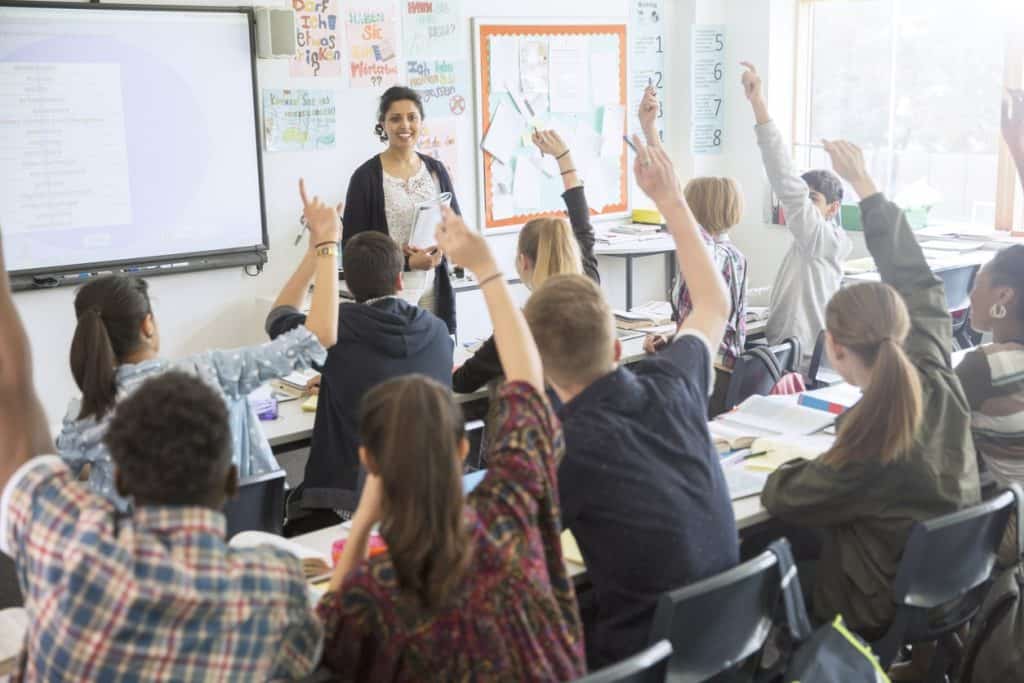 Students actively participating in the discussion during a language class